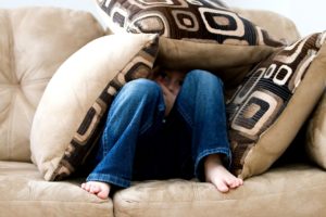 IMAGE - little boy hiding