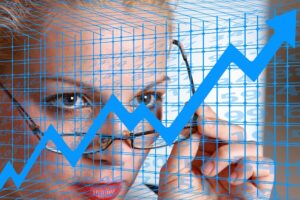 woman looking at graph of investment performance