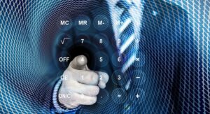 business man using calculator