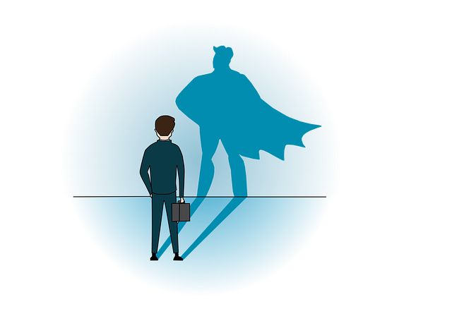 business man with superhero shadow
