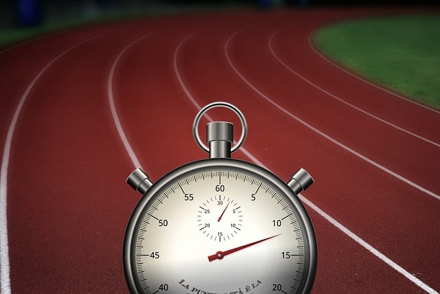 stopwatch with racing track background