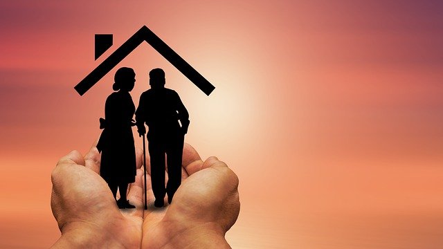 elderly couple in their house