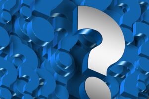 white question mark on blue background