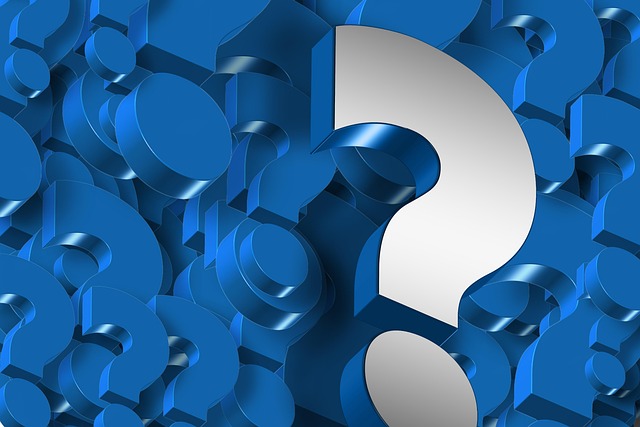 white question mark on blue background