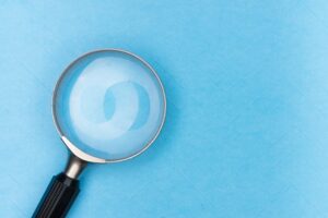 investigating through a magnifying glass